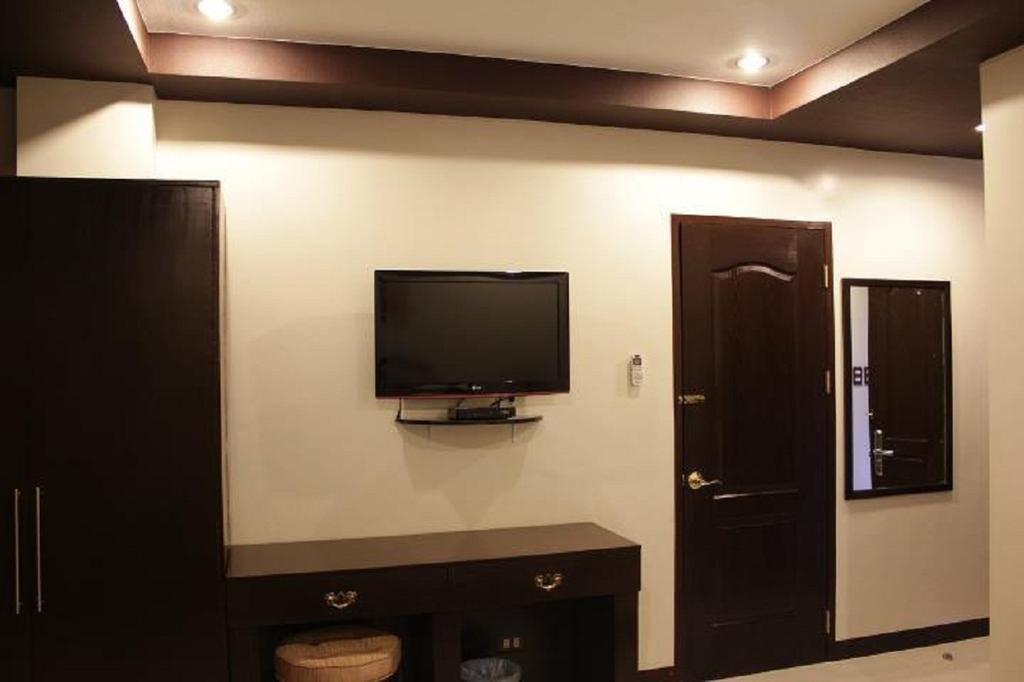 Peridot Suites Davao Stadt Zimmer foto