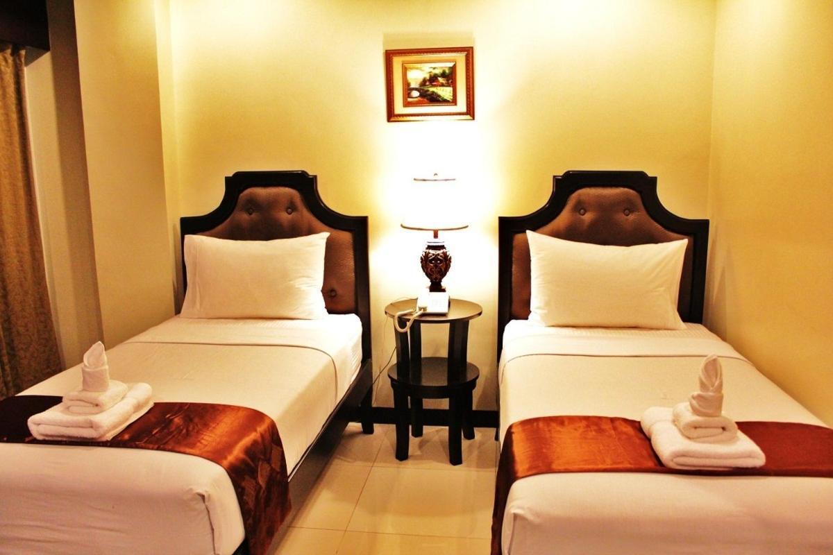Peridot Suites Davao Stadt Zimmer foto