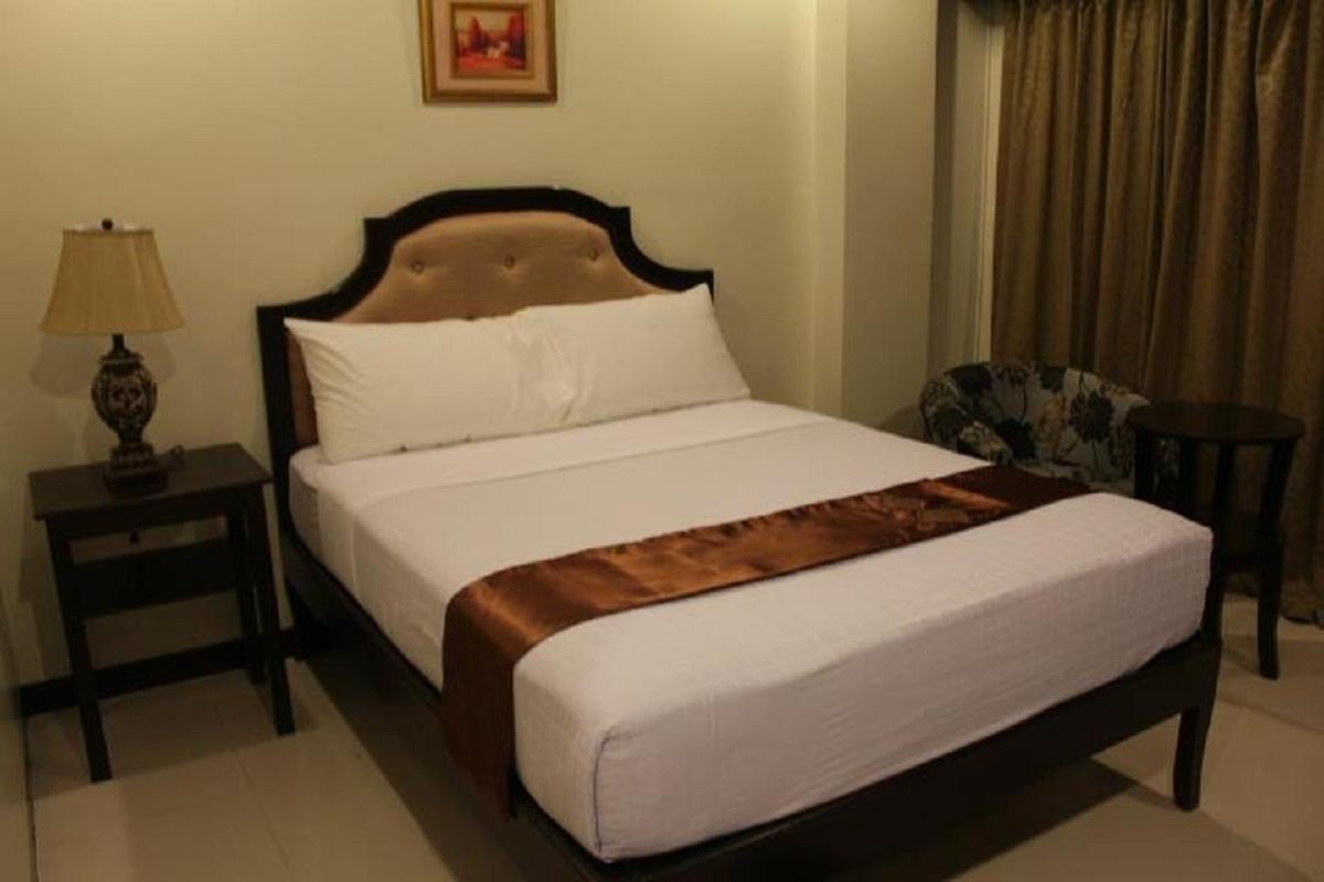 Peridot Suites Davao Stadt Zimmer foto